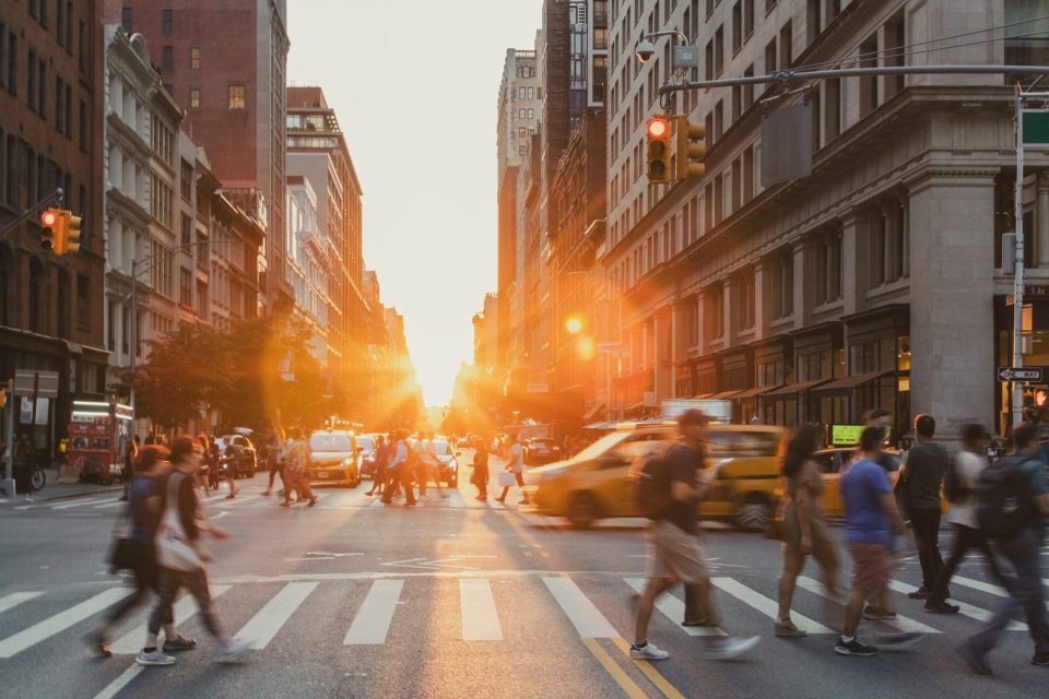 Busy,Intersection,Is,Crowded,With,People,And,Cars,On,5th